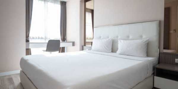 How to Make Your Bed Look Fluffy and Hotel-Worthy